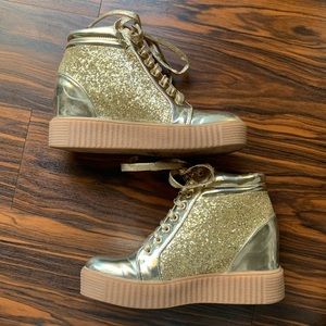 Gold high top sneakers
